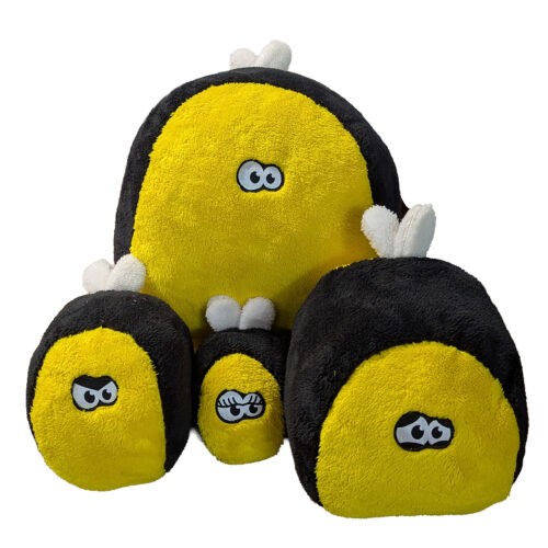 Soft yellow and black plush bee toys stacked together with cartoon eyes.