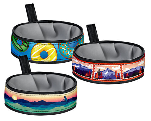 Three collapsible pet bowls with colorful printed sleeves (donut pattern, mountain landscape, and sunset) and black strap handles. Great for travel and feeding on the go.