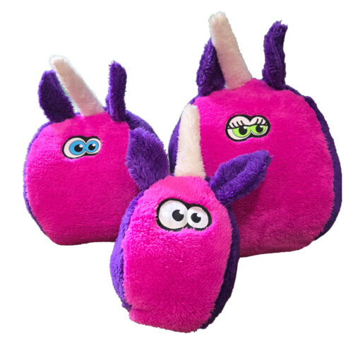 Three pink and purple plush monster toys with big eyes and fluffy ears, grouped together as a fun stuffed toy set.