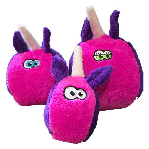 Three bright pink and purple plush monster toys with cartoon eyes, arranged together.